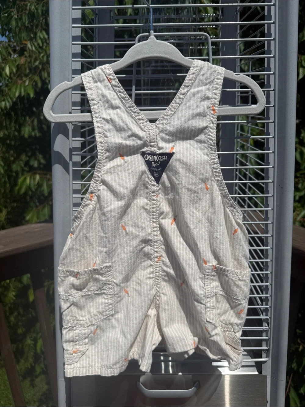 OshKosh B'gosh Cream and Light Gray Striped Short Overalls with Orange Carrots